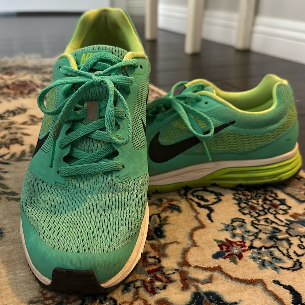 Green Nike running shoes size 8.5
